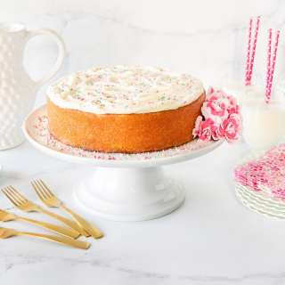 Strawberry-Glazed Pink Velvet Cake with Almond Buttercream
