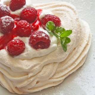 Meringue Hearts with Whipped Cream and Raspberries