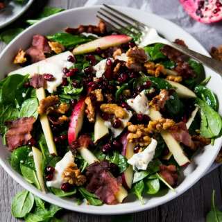 A winter salad - spinach, apple, gorgonzola and candied walnuts