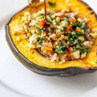 ROASTED STUFFED ACORN SQUASH WITH QUINOA AND KALE