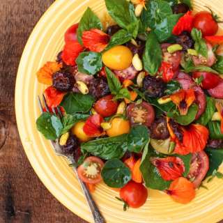 Tomato Nasturtium Salad with Dates and Pistachios