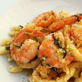Busiate pasta with bottarga, almonds and prawns