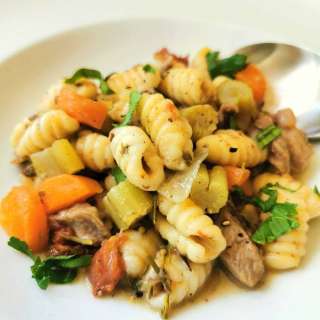 Homemade Sardinian Gnocchi (malloreddus) in Lamb Broth.