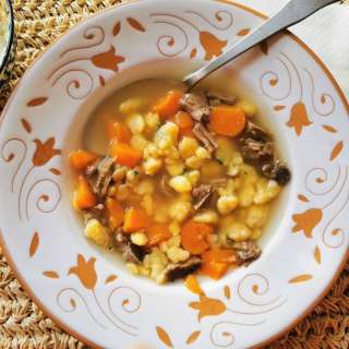Homemade pastina in broth (millefanti in brodo)