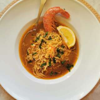 Italian fish soup with angel hair pasta