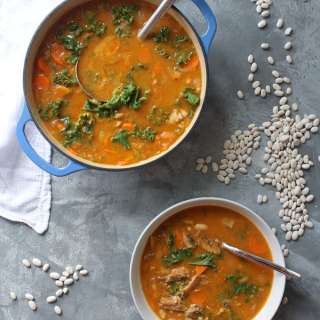 White Bean and Kale Soup with Smoked Fish
