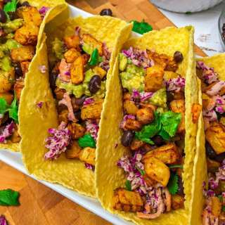 Crispy Potato Tacos with Black Beans + Slaw