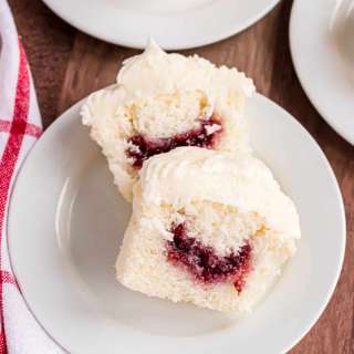 Almond Wedding Cake Cupcakes with Raspberry Filling
