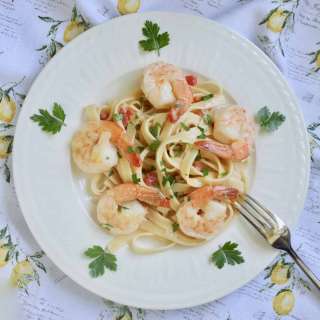 Shrimp Fettuccine with a Light Cream Sauce and Tomatoes