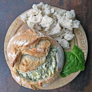 Hot Spinach and Artichoke Dip in a Sourdough Bread Bowl