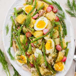Potato and asparagus salad with eggs and smoked trout