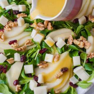 Pear walnut salad with cranberries and goat cheese
