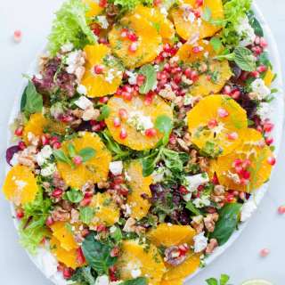 Orange pomegranate salad with mint lime dressing