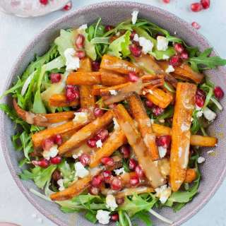 Roasted carrot salad with pomegranate and peanut butter lemon dressing