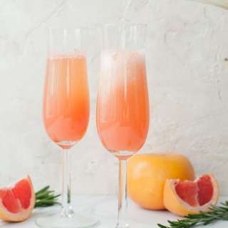 Grapefruit mimosa with rosemary