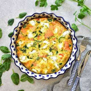 Smoked salmon frittata with zucchini, spinach, and goat's cheese