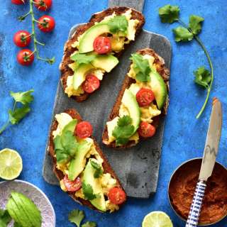 Harissa, scrambled eggs, avocado, and coriander sourdough toast