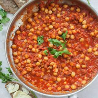 Chickpeas with chorizo in spicy tomato sauce