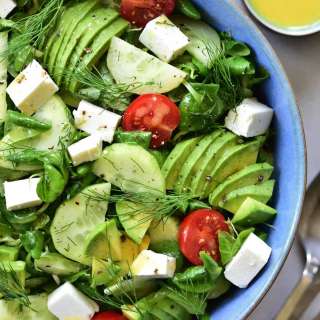 Cucumber avocado tomato salad with dill and feta