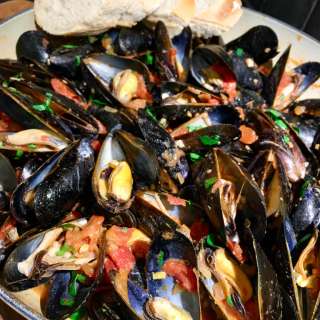 Portuguese Style Mussels in Spicy Chourico Tomato Sauce