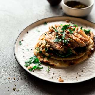 Grilled Chicken Flatbread with Za'atar Hummus and Sumac Caramelized Onions