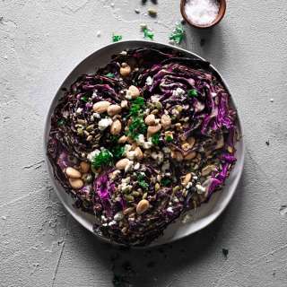 Roasted Red Cabbage with Tahini, Goat Cheese, Nuts & Seeds
