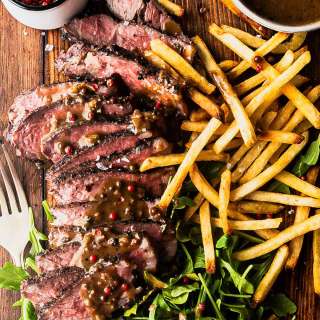 Sous Vide NY Strip Steak au Poivre with Creamy Pink Peppercorn Sauce
