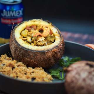 Roasted Shrimp and Chicken Curry Stuffed Coconuts