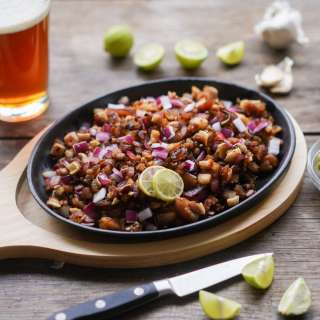 Pork Sisig (Charcoal Grilled, Served on a Sizzling Platter)