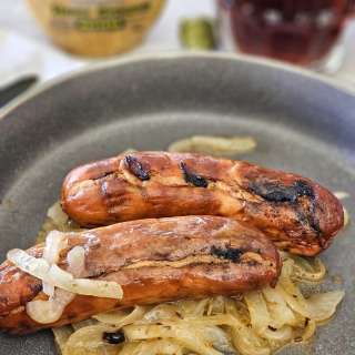 Grilled German Knockwurst with Seasoned Onions