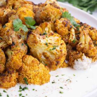 Curry Roasted Cauliflower with Yogurt Sauce