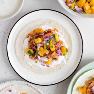 Instant Pot Shredded Chicken Tacos with Mango Salsa and Lime Crema