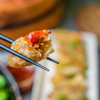 Crispy rice dumplings with red jujube dates and chili dipping sauce