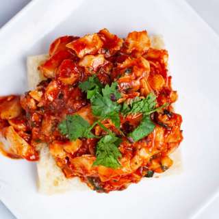 Cod Focaccia Sandwich With A Red Tomato Sauce