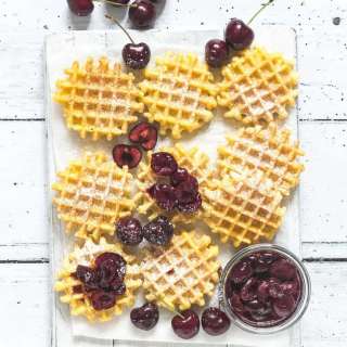 Waffles with cherry sauce