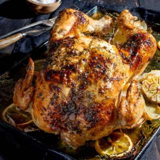 Juicy Greek Roast Chicken with Garlic and Herb Butter