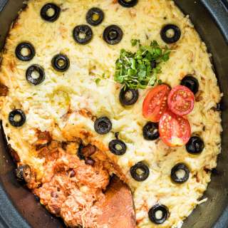 Easy Slow Cooker Chicken Enchiladas Casserole