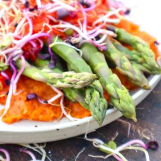 Green asparagus with bell pepper garlic sauce and mashed sweet potatoes