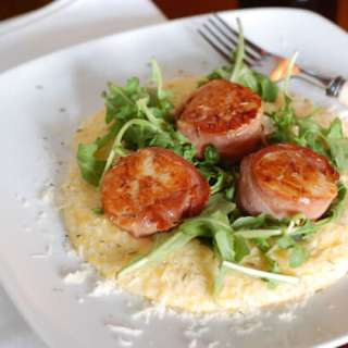 Prosciutto Wrapped Scallops Over Whole Grain Polenta