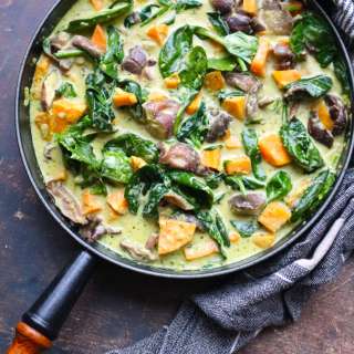 Thai green curry with sweet potato, spinach and mushrooms