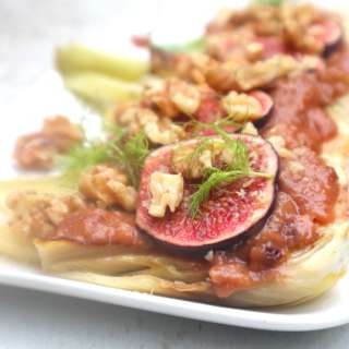 Braised fennel bulbs with an orange fig maple sauce and walnuts