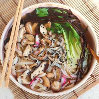 Japanese ramen - noodle soup with shiitake and seaweed spaghetti
