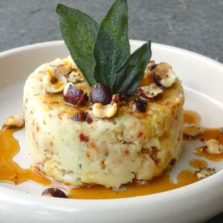 Parsnip puree with roasted hazelnuts, fried sage leaves and orange maple sauce