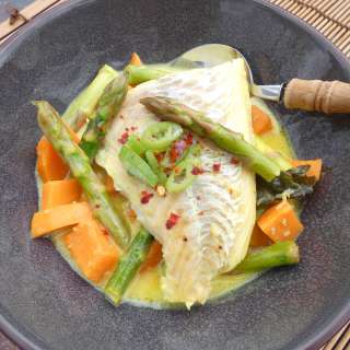 Thai sweet potato curry with cod, green asparagus and coconut milk