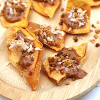 Dried mango snack with almond butter, coconut and bee pollen