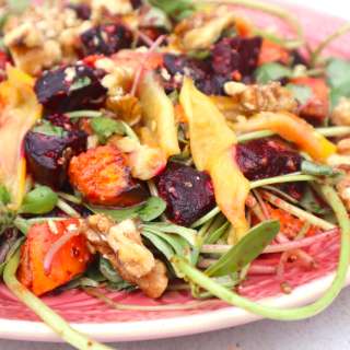 Sweet potato salad with purslane, red beet, yellow bell pepper and a sweet grapefruit chili dressing