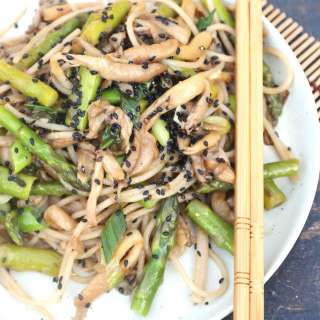 Noodles with oyster mushrooms, green asparagus, scallions and sesame seeds