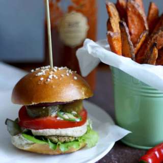 Vegan Falafel Burger with Tahini Sauce and Sweet Potato Fries