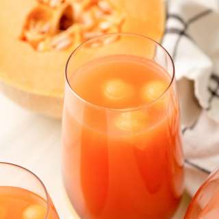 Tropical Rum Punch (with frozen melon balls)