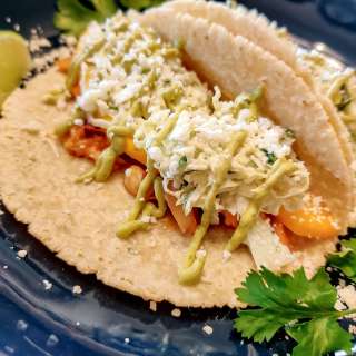 Brook Trout Tacos with Chipotle Avocado Crema